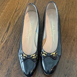 Salvatore Ferragamo Black Flats with Gold Accents